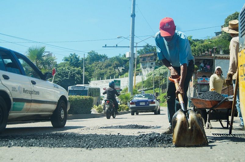 mezcla asfáltica en caliente y emulsión adherente